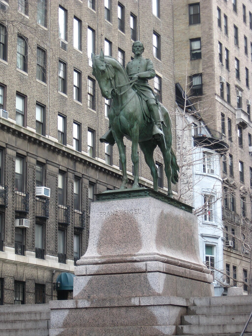 Looking east and up at statue of Franz Sigel on a cloudy afternoon on Riverside Drive, Manhattan. See also File:Franz Sigel 106 RSD jeh.JPG